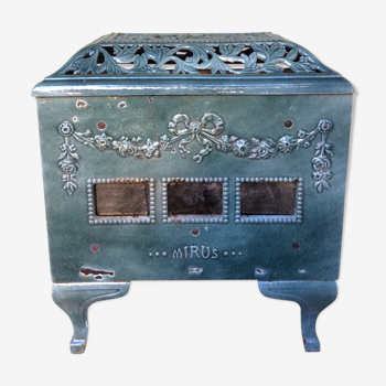 Old wood stove in enamelled cast iron