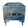 Old wood stove in enamelled cast iron