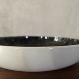 Glazed ceramic dish with flower decoration by Youen