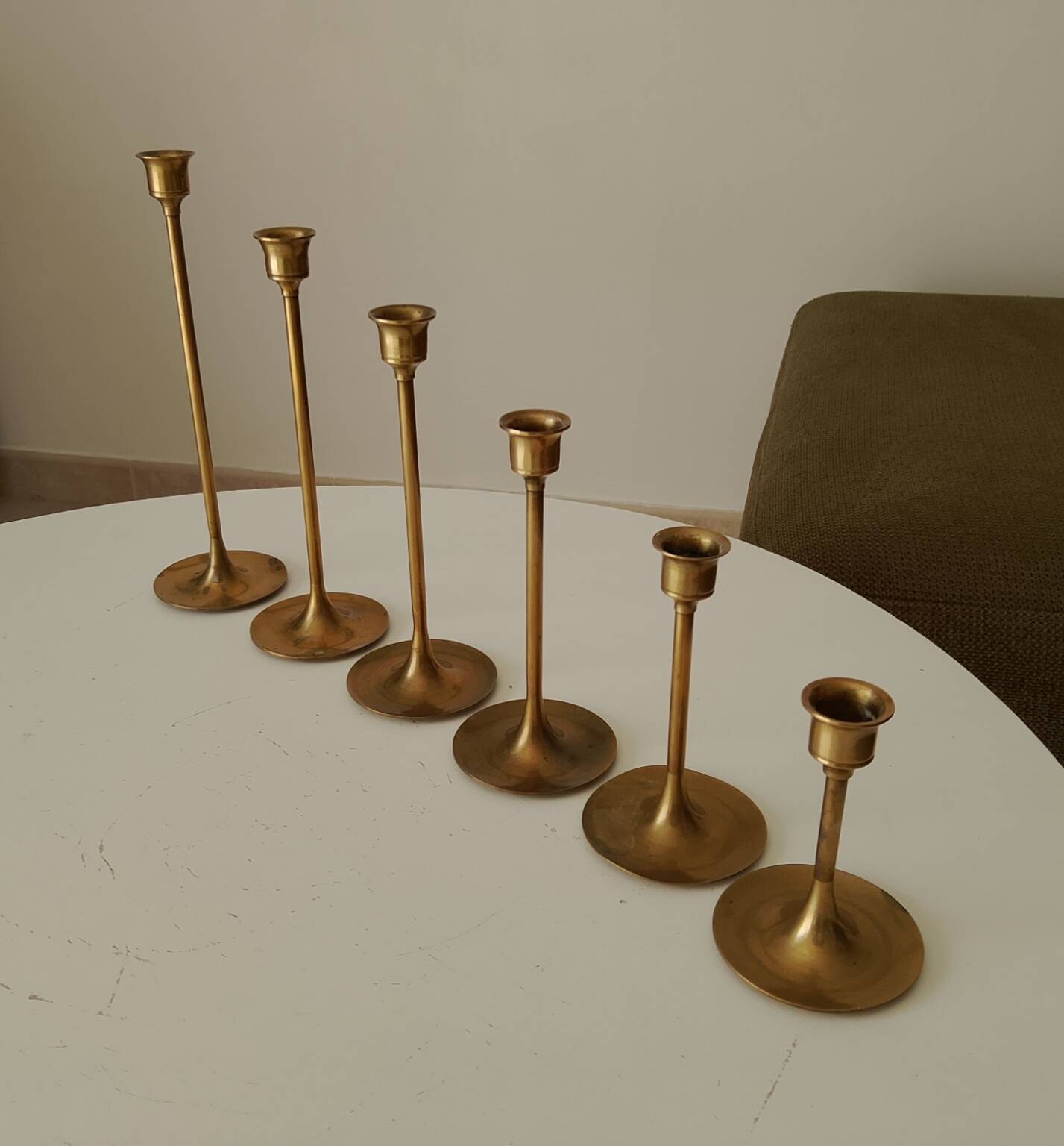 Set of 6 Scandinavian brass candle holders from the 1960s.