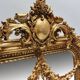 Miroir baroque doré avec guirlande de fleurs