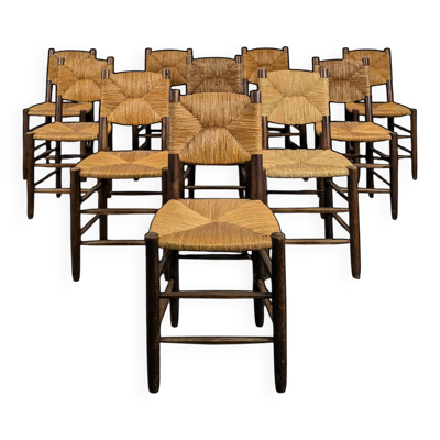Série de 10 chaises modèle Bauche par Charlotte Perriand, circa 1960
