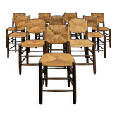 Série de 10 chaises modèle Bauche par Charlotte Perriand, circa 1960