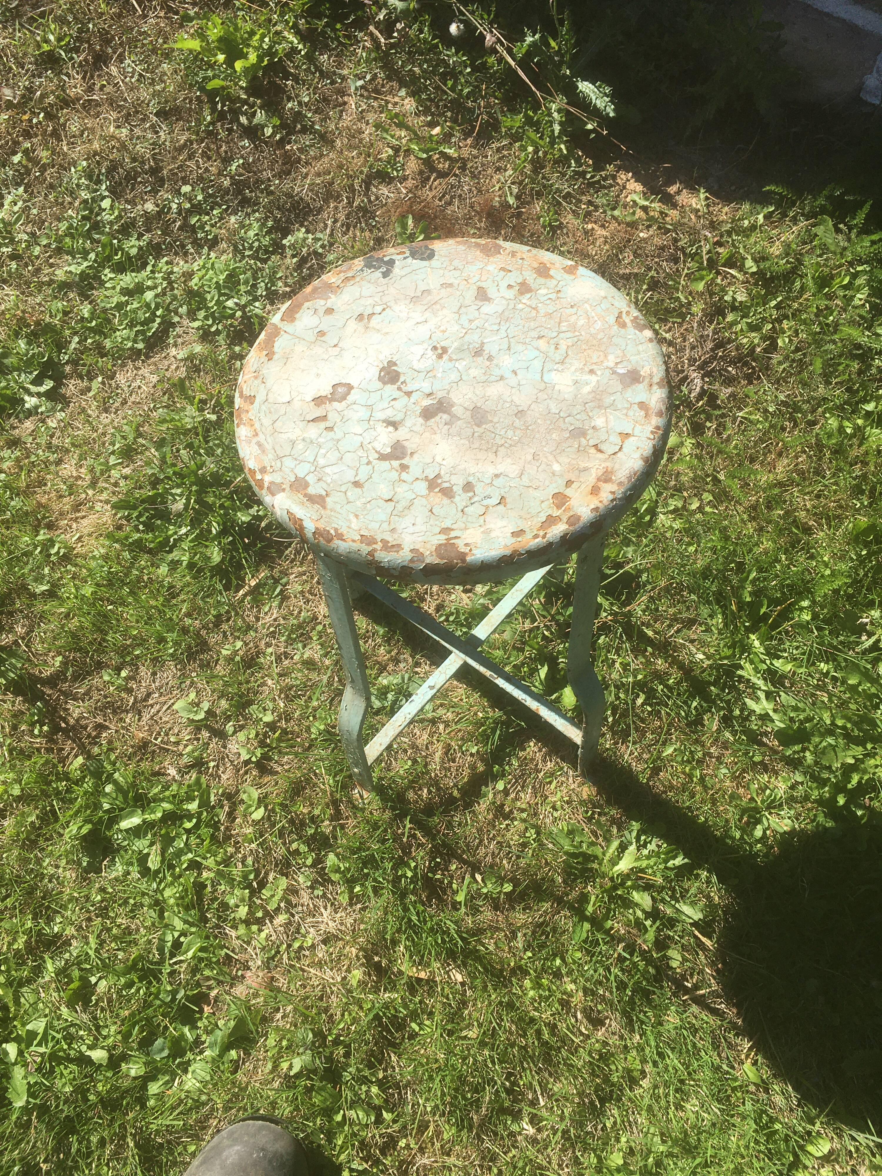 Patinated metal industrial stool