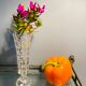 Duo of small bevelled crystal vases