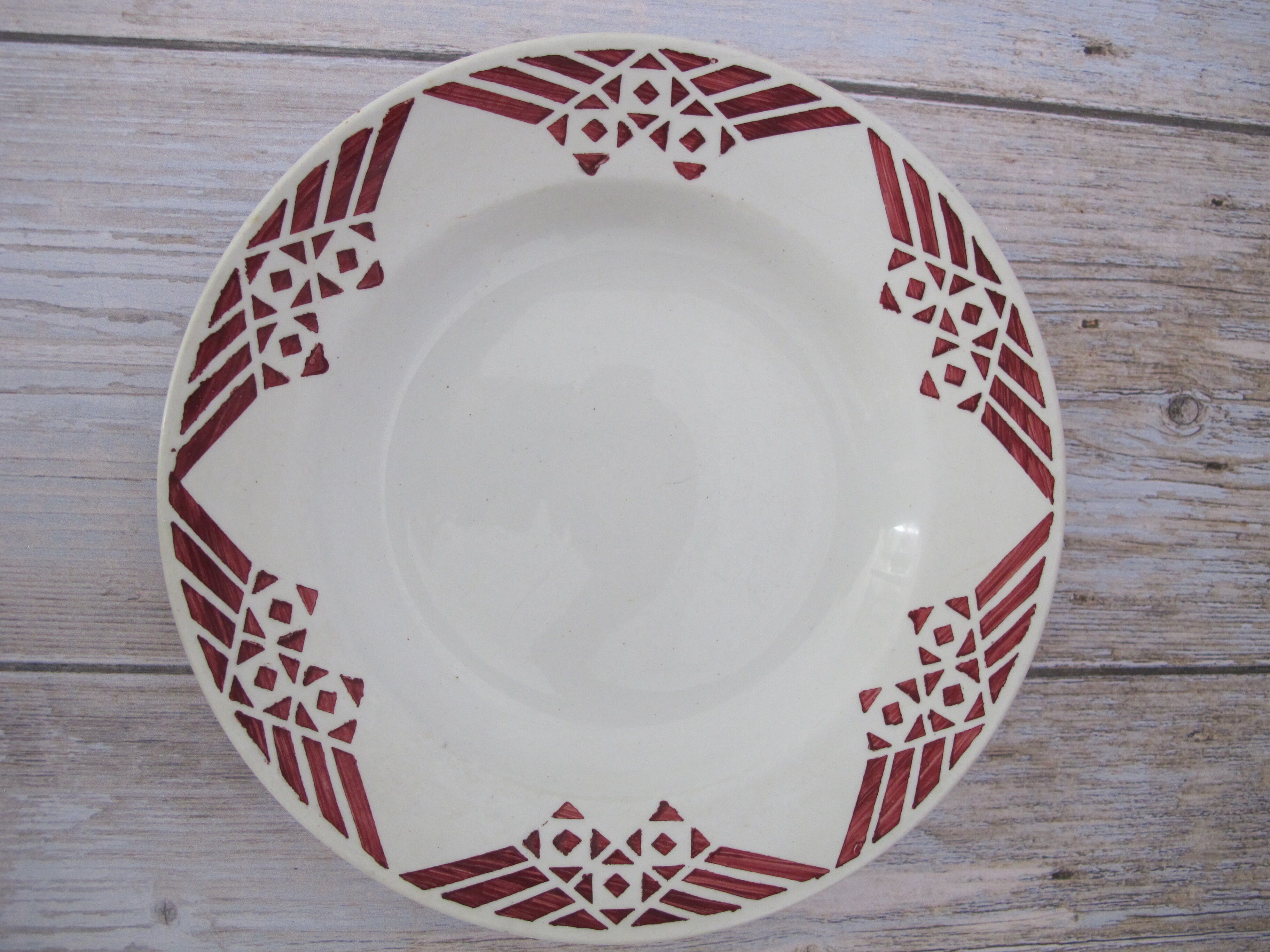 2 hollow plates made of Saint Amand earthenware