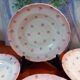 Set of 4 antique deep plates from St Amand in the "Vine Leaves" pattern.