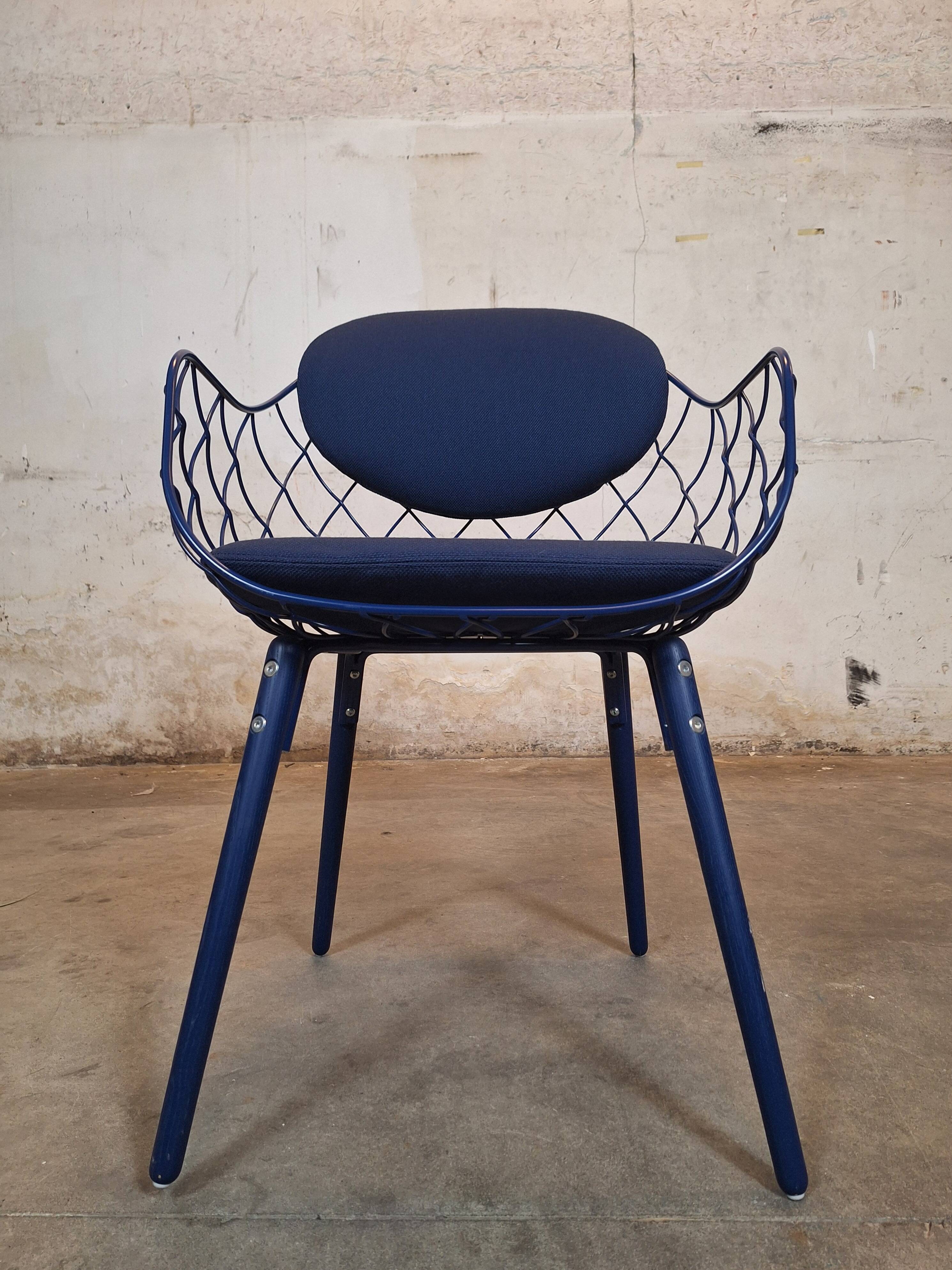 Magis Piña blue chair with metal frame and padded seat