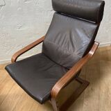 Leather armchair with footrest