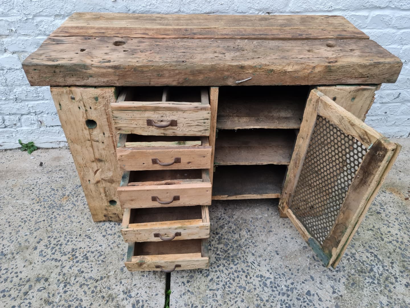 Old established a door and five drawers raw wood