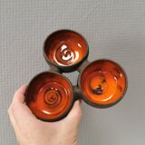 Beautiful bowl (composed of 3 bowls) with orange/red glaze inside