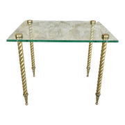 End of sofa, glass and twisted legs in gilded metal
