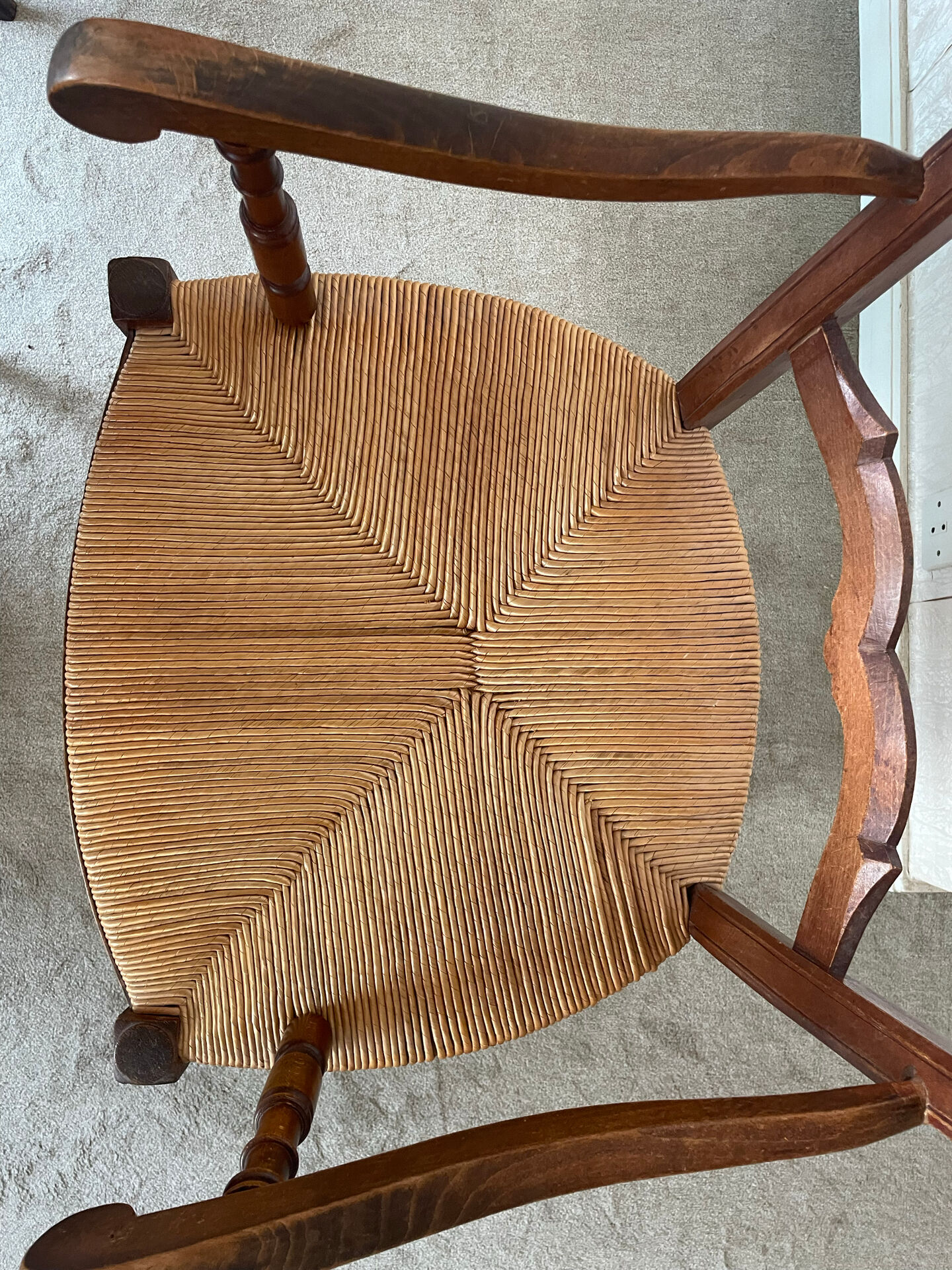 Antique ladderback chair, very high backrest, rush seat.