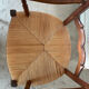 Antique ladderback chair, very high backrest, rush seat.