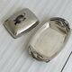 Antique shiny metal butter dish