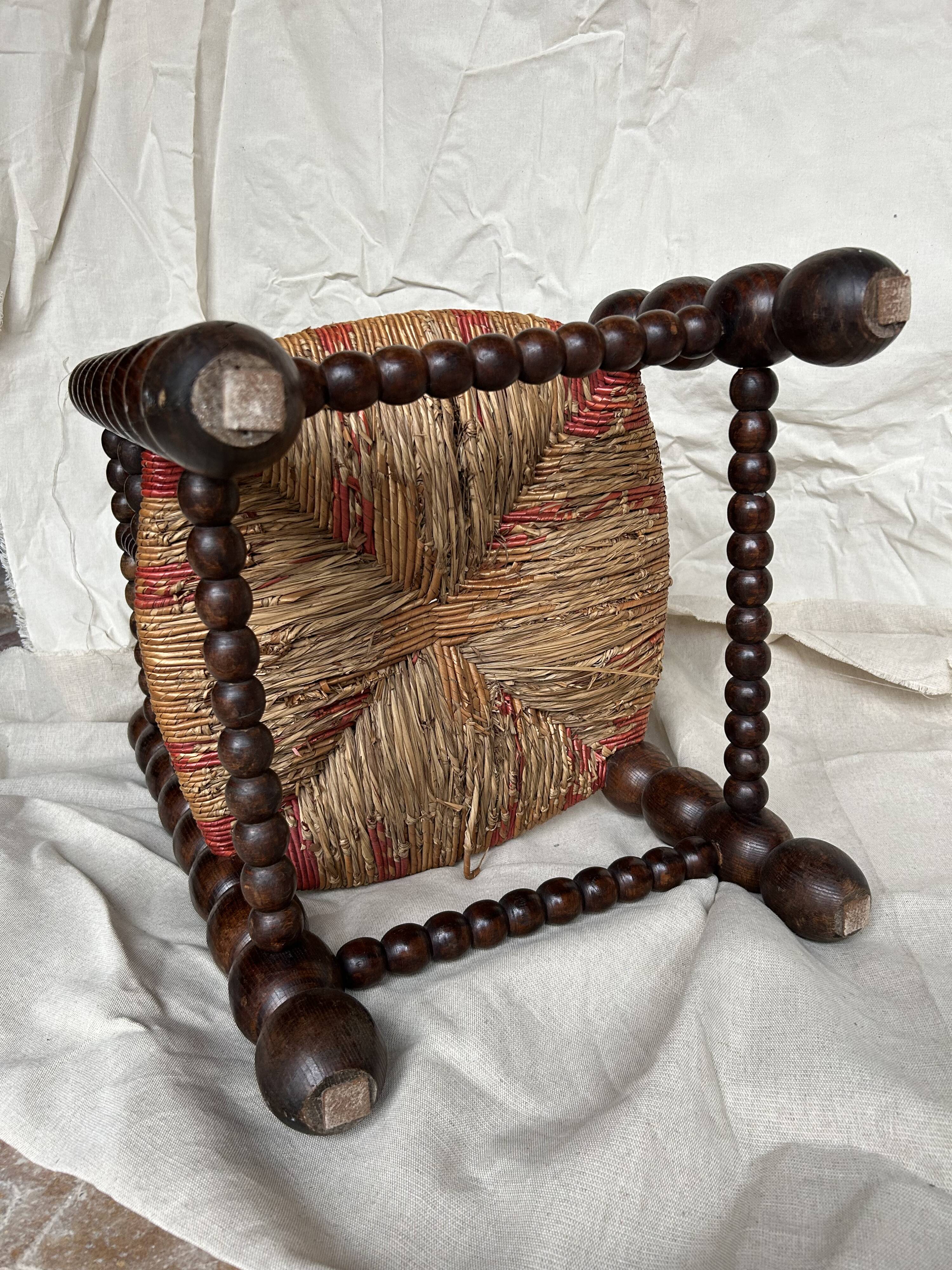 Turned wooden chair by Charles Dudouyt