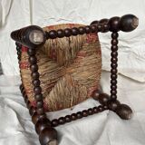 Turned wooden chair by Charles Dudouyt