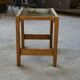Solid oak side table with fabric decoration top