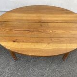 8-legged ash table with 6 extensions.