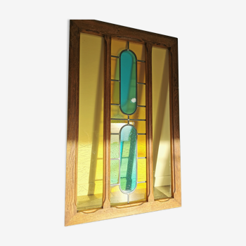 Stained glass window with framing