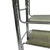 Smoked glass and chrome metal table with casters