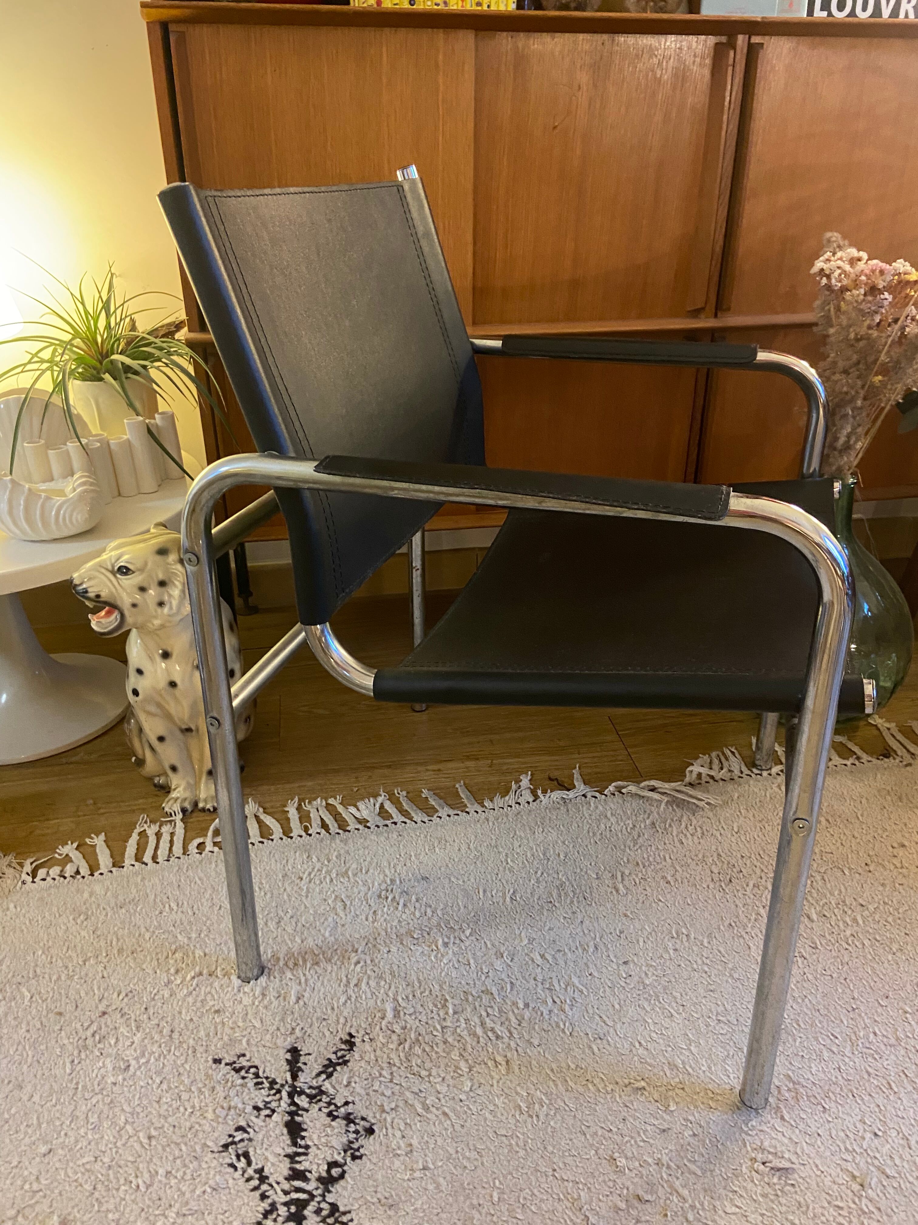 Tubular armchair and vintage skaï