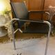 Tubular armchair and vintage skaï
