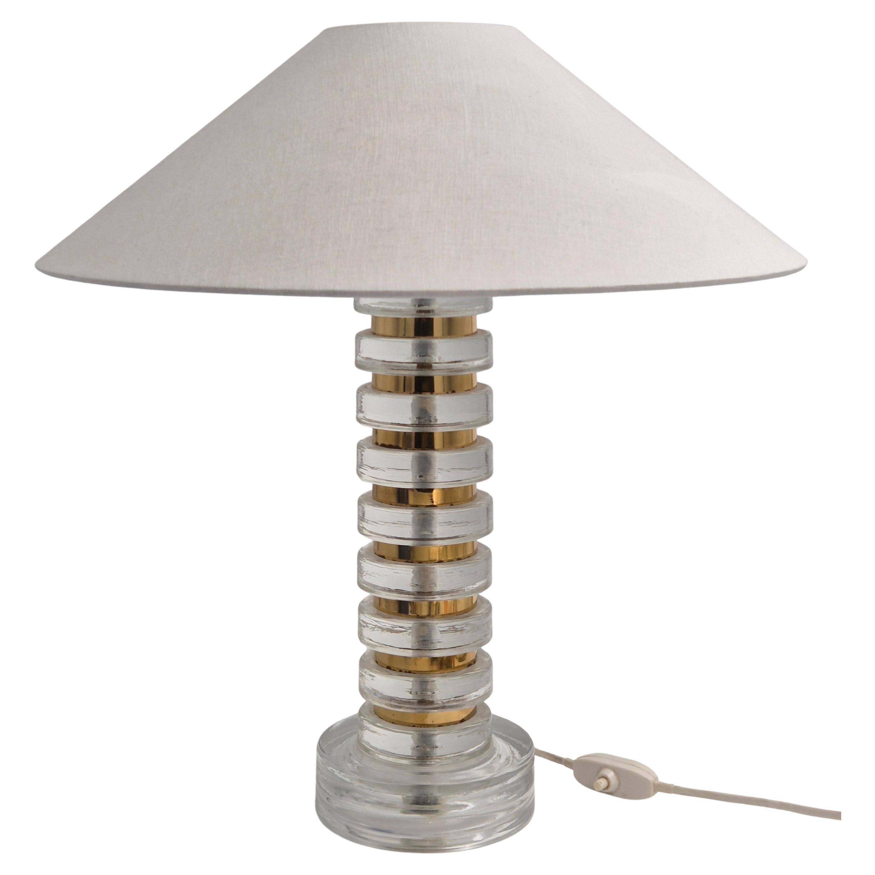 The Modern Scandinavian / Midcentury Modern table lamp with Orrefors glass and brass.