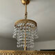 Brass chandelier and crystal tassel waterfall