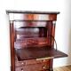 Empire secretary with openwork.