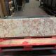 Louis XIV-style fireplace has 19th century veined pink marble hood