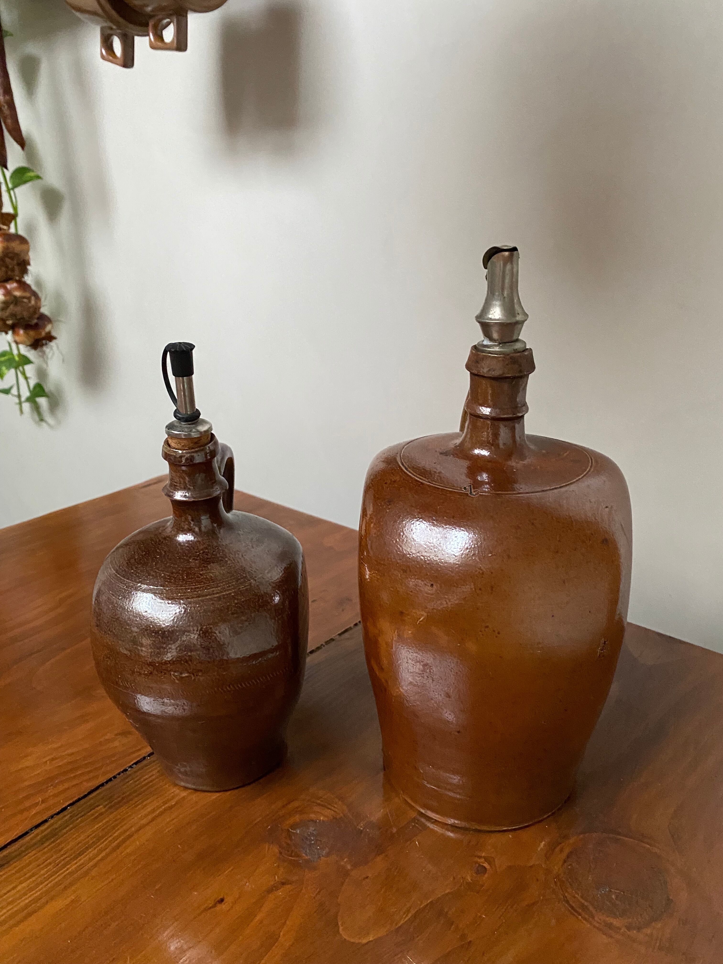 Pair of bottles in sandstone