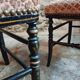 Pair of antique Napoleon III chairs in blackened wood and fabric.