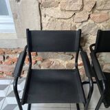 Pair of black armchairs