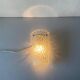 Simple arch-shaped wall light in textured glass, 1950s, Germany.