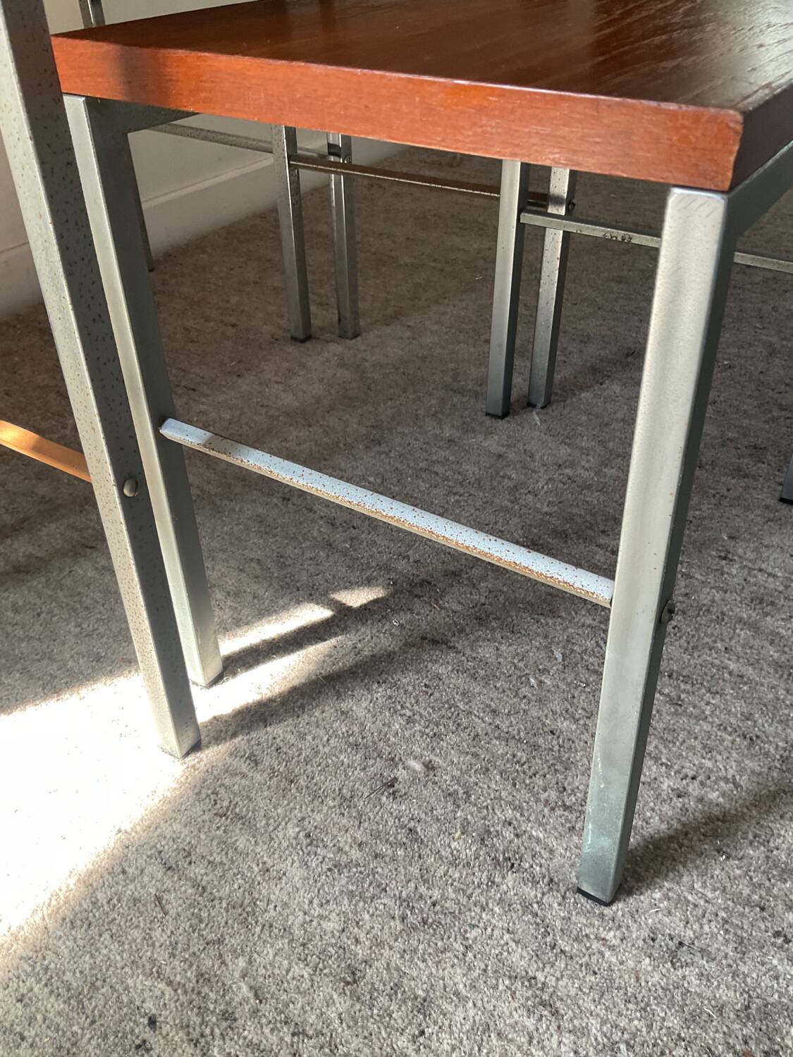 Trio of teak and chrome metal nesting tables from the 60s-70s