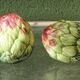 Pair of salt and pepper shakers in earthenware, artichokes