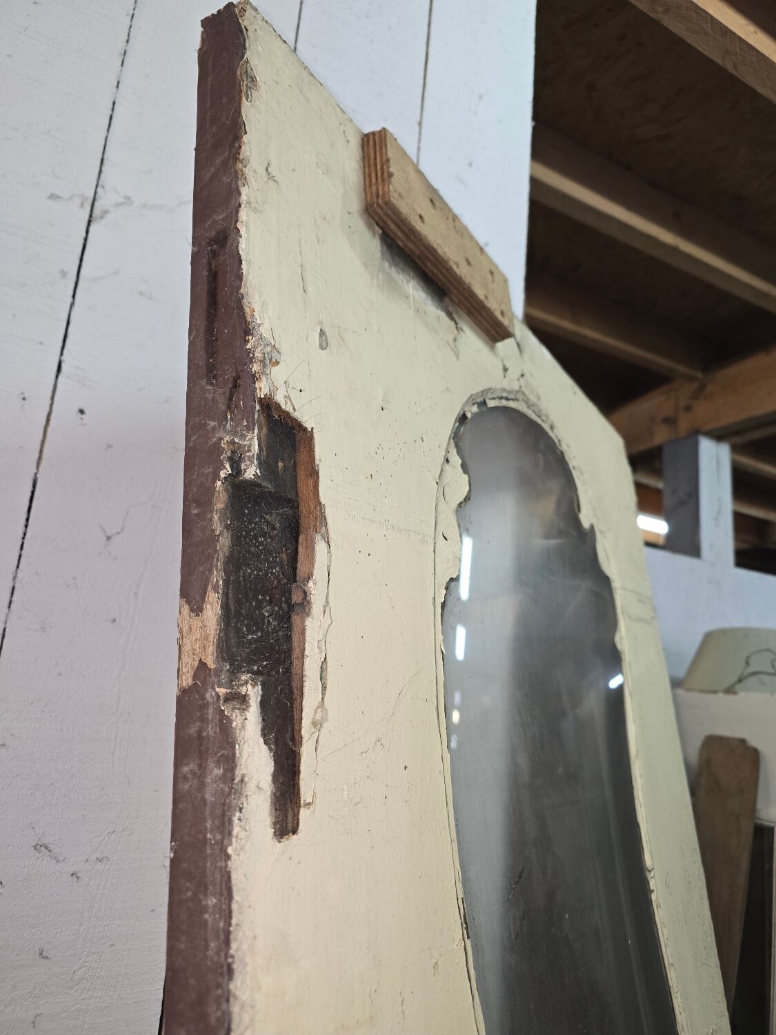 Old glass shop door in oak