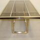 Dining table in chrome-plated steel and brass by Romeo Rega circa 1970