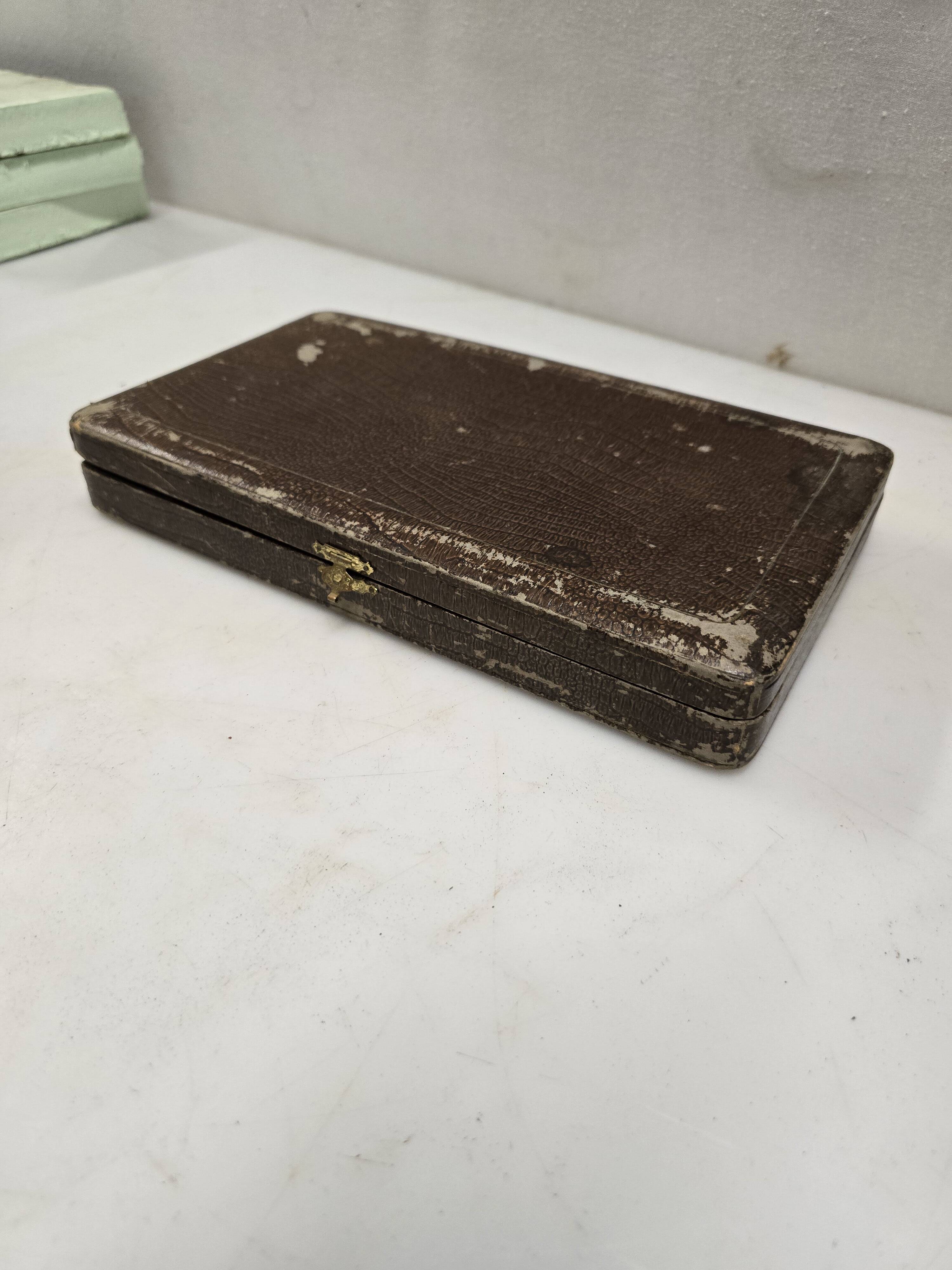 12 silver-plated knives from the mid-20th century