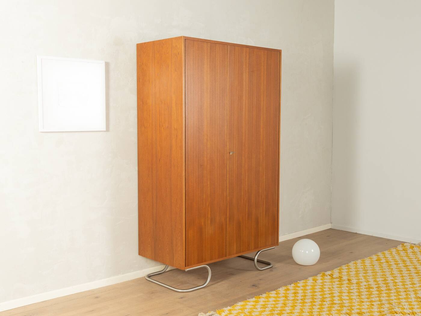 Purist wardrobe from the 1960s in teak veneer by DeWe
