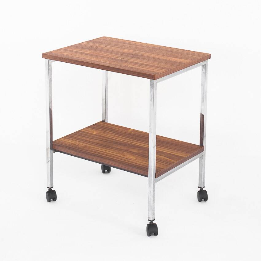 Vintage side table on wheels. Chrome-plated iron tube and wood. France, 1970s.