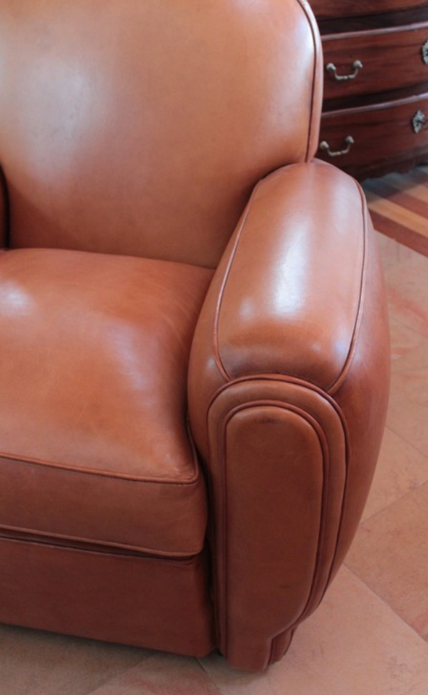 Pair of club chairs in leather