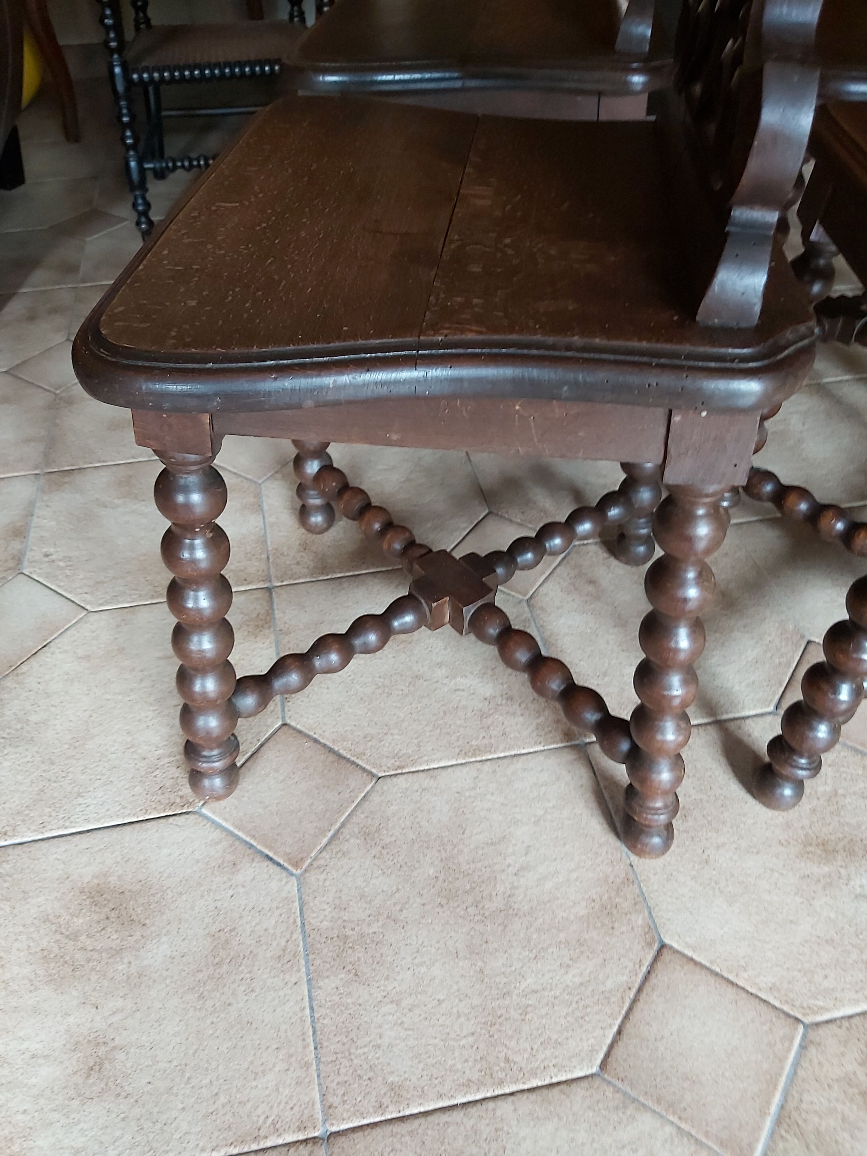 4 stylized dolphin back chairs