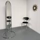 Large freestanding chrome metal full-length mirror in 1970s design.