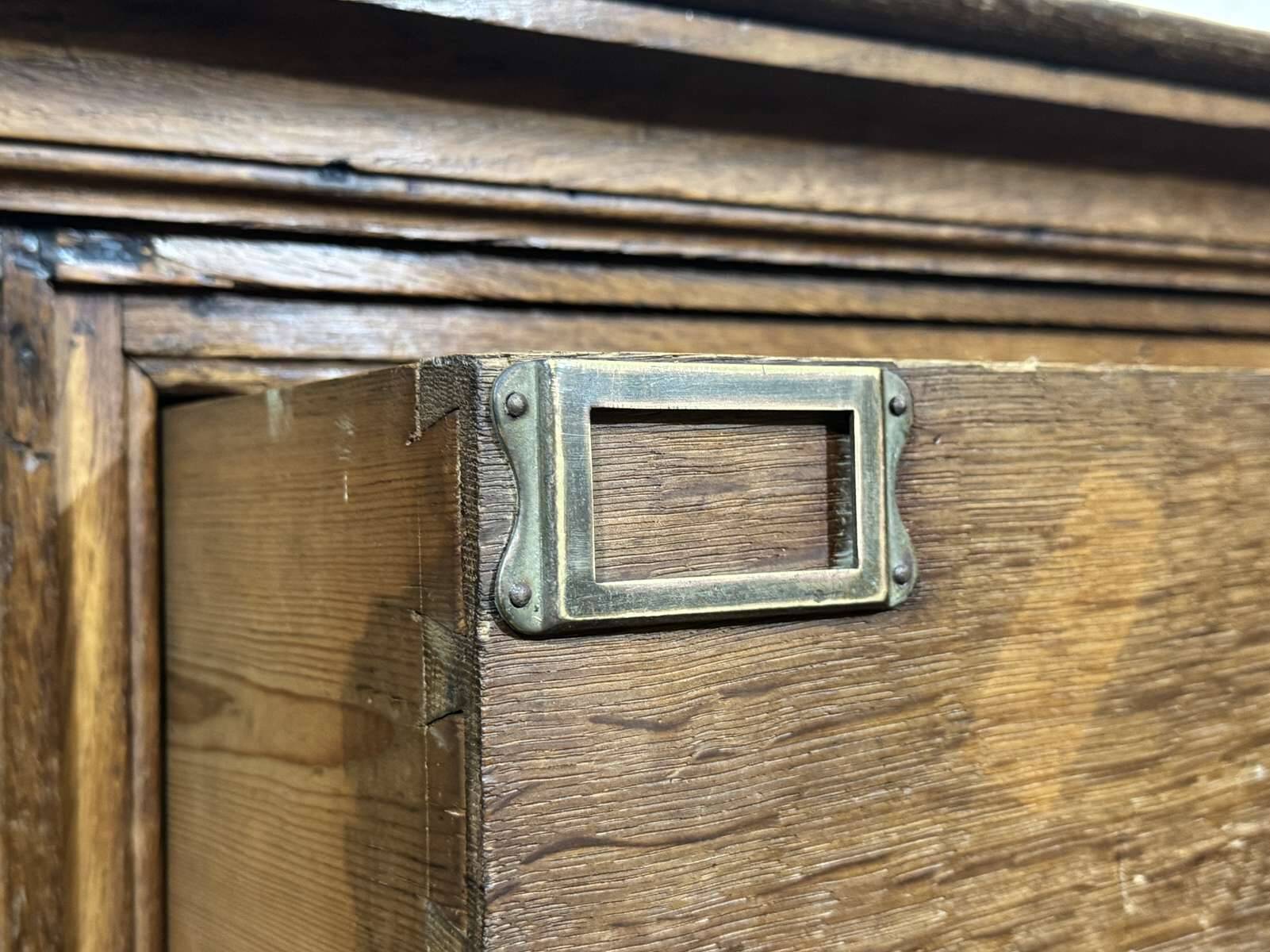 Notary's cabinet with 18 drawers in oak and fir from the early 20th century.