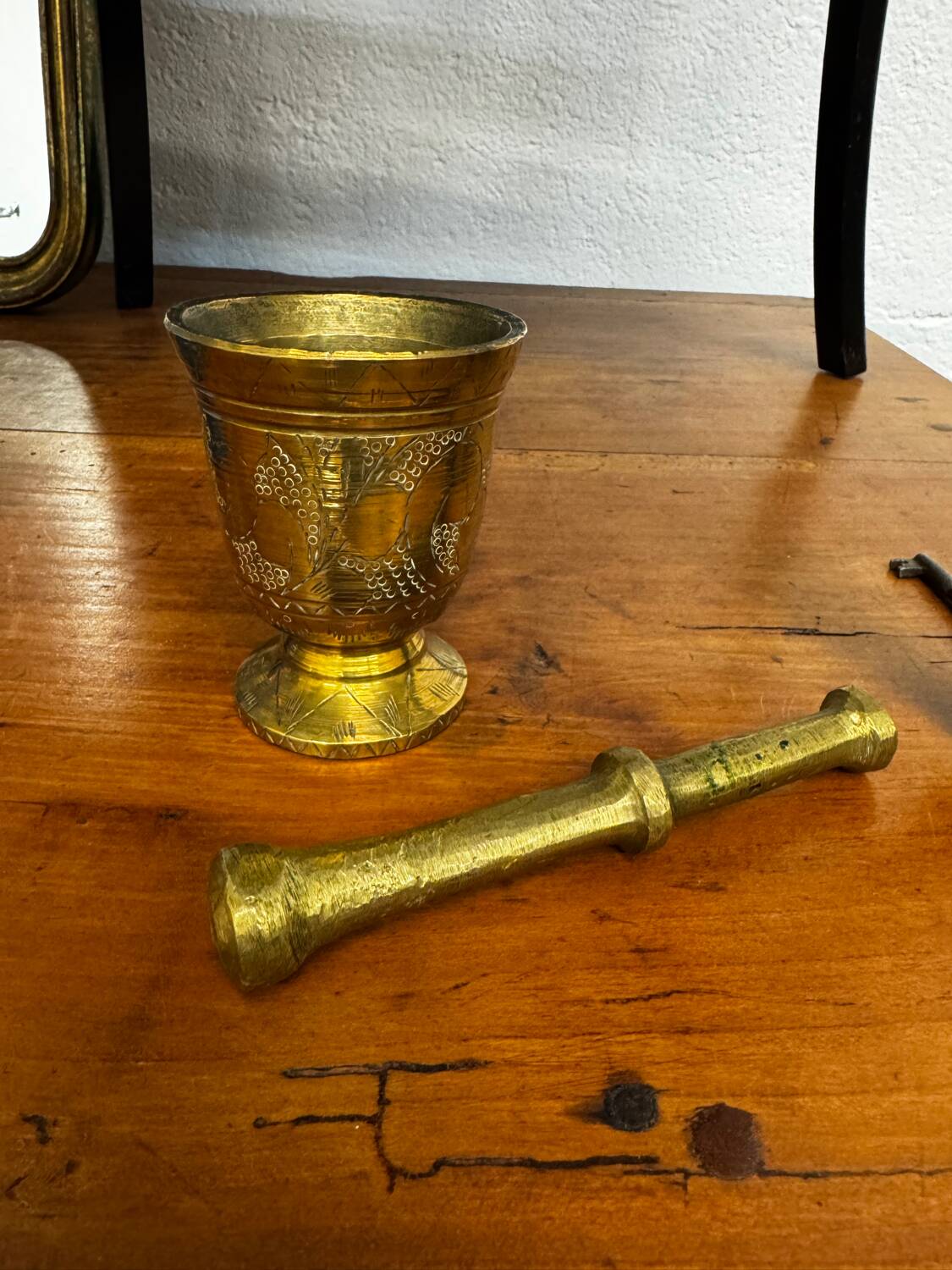 Golden brass mortar and pestle