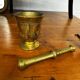 Golden brass mortar and pestle