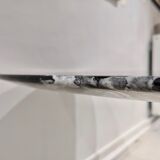 Tulip table white base and black marble marked by Saarinen edition knoll international