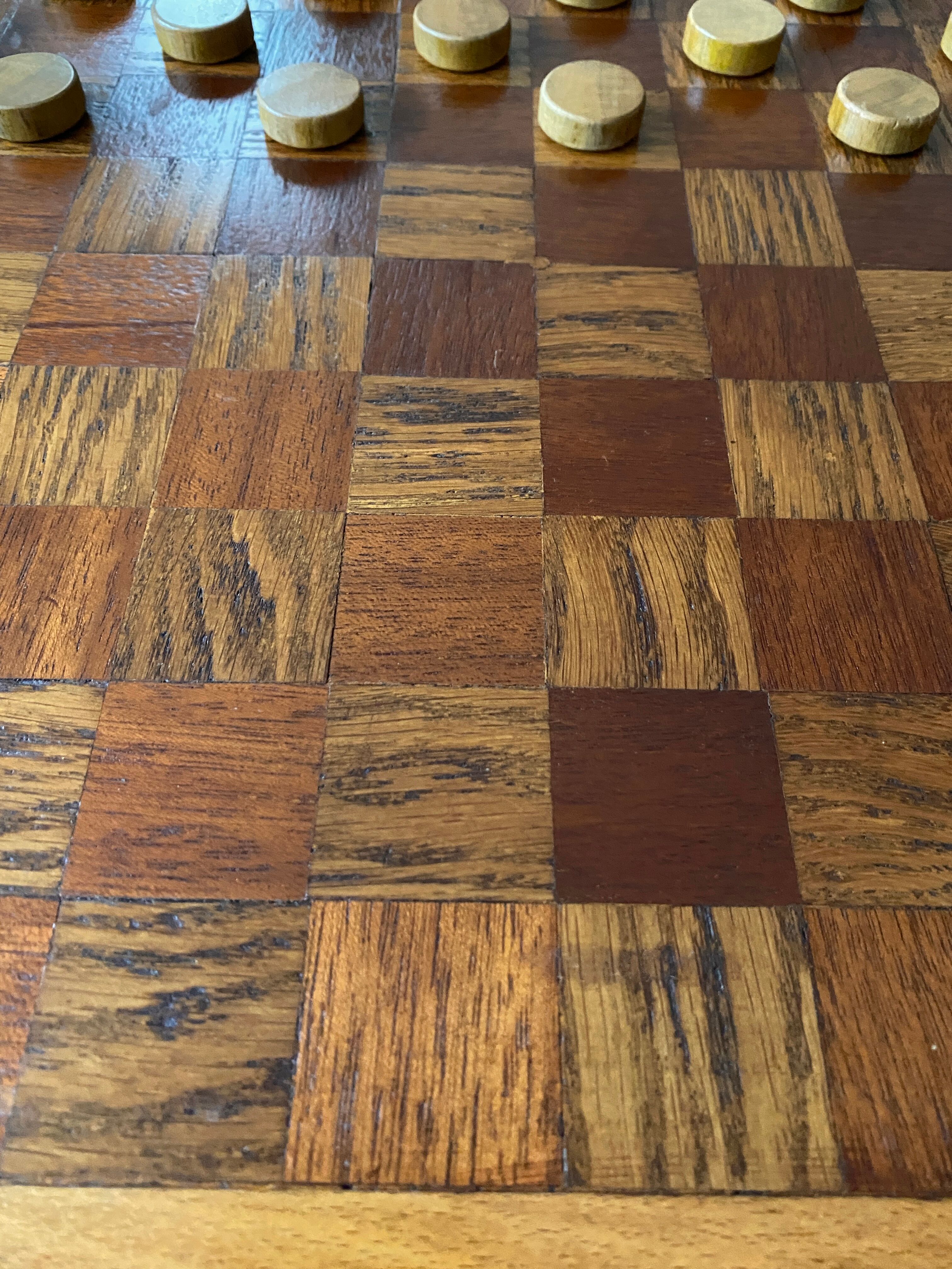 Old wooden checkers board